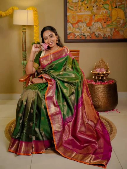 Emerald Green Kanchipuram Silk with Pink Peacock Border